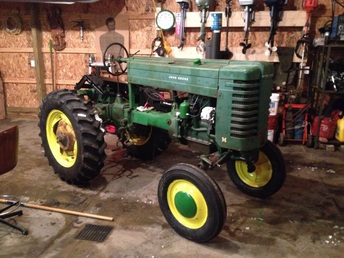 1948 John Deere M  - Took me 4 years but I'm on the home stretch  needs the fuel tank lined and the front axle pin  fixed and paint everything has been rebuilt