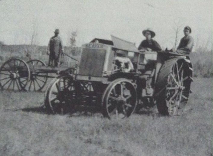 1919 Beaver - The picture was taken on our land in 1919 and the tractor was brand new in the pic. To my knowledge Beaver tractors were manufactured in Brampton, Ont. and discontinued years later.  I'd like to know if the one in the picture is the bigger or smaller model since there were two sizes. Someday (although that's asking for a lot) I'd Love to own one of these tractors.