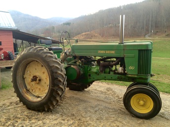 1955 John Deere 60 - Nice John Deere 60 with power steering. New  rubber. Excellent mechanical shape. And  excellent sheet metal. Complete and correct jd  801 hitch. Call Darin for more pics and info @828- 507-0430