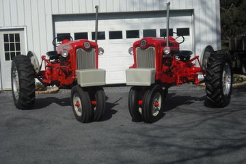 1959 Ford 771 - One pictured on the right was just restored and is gas powered. The one on the left is diesel powered.