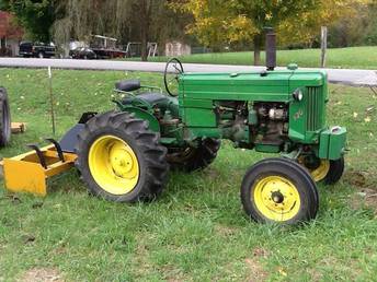 1956 J.D. 420-S  - Found in Western Ky. used to mow farmland , stack weights taken off due to no power steering .