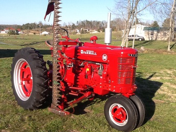 M Farmall - 1948 M with Kosch mower. She is still mowing hay at 67 years young