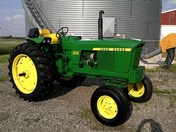 1966 John Deere 2510 Restored -     Fresh out of the shop, 1966 model 2510 gas.  Not my usual color to restore, and after a few  trips to the local JD dealer, it now makes going  to the Harley shop, feel like a trip to Dollar  General...ugh!