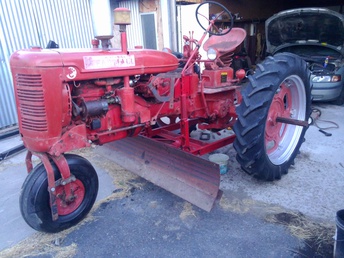 Farmall Super C  - The tractor is directly off of the farm.  It runs verybgood, hydraulics work,no fast  hitch. Includes a belly mount model C 72  Grader. Kind of a rare item. We  haveprocured a manual for the blade. Most  parts are there but front mounting bracket  missing. Could manufacture them if  required.