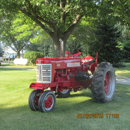58 Farmall 450 -   Waiting for warm weather to go pulling.
