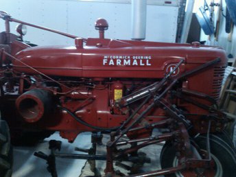 41 Farmall H With Cultivator - Farmall H with cultivator with orignal paint. Looks to be HM 250 Cult. Hard to see but it still is there.  It works, used it on sweet corn