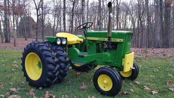 1966 John Deere 110 - My dad had his old 1966 John Deere 110  restored for me as a Christmas gift.  What a wonderful surprise Christmas  morning for this thirteen year old girl!