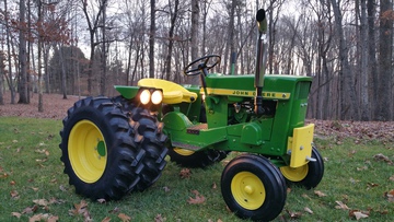 1966 John Deere 110 - My dad had his old 1966 John Deere 110  restored for me as a Christmas gift.  What a wonderful surprise Christmas  morning for this thirteen year old girl!