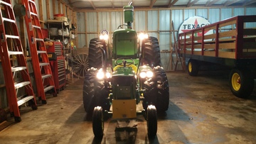 1966 John Deere 110 And 1969 John Deere 4020 - Mine and dad's tractor in the shop.