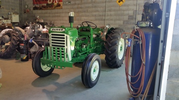 1962 Oliver 550 Diesel - This 1962 Oliver 550 diesel has been in the  family since new with all the documents and  bill of sale from factory and the purchase  date with the 4 orginal wheel weights front  and rear and 3 front stack weights that's  not on the tractor at this time we are  almost finished with this tractor