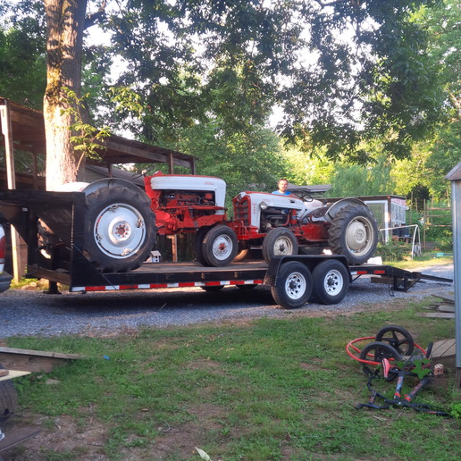57 Ford 960 And 55 Ford 640 - Loaded up. Headed to Tannyhill  state park for a show. Bet we  have only ford row crop in the  show. Not many down south.  Working tractors going in their  work clothes!