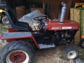 Wizard   ( Western Auto) - was given this tractor, cannot find any model or serial number, only found a plate describing the tractor, anyone have any idea how to find the model number, or a guess of what year it might be? the stack coming out the top, was added by the previous owner.  the plate gives the 16 hp briggs