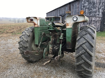 1972 Oliver 1955 W/ Fender Tanks - Found this tractor in an old warehouse and it had  not ran for 19 years. Got it home and put some fuel  in it and replaced the injection line return T's and it  fired right up. Runs great and everything works as  it was 1972 all over again. One of my best finds.  Going to give it a paint job soon. Never had one of  these before but they handle great. Starts when it  is cold and has the 18 speed transmission and will  hold about 110 gallons of fuel.