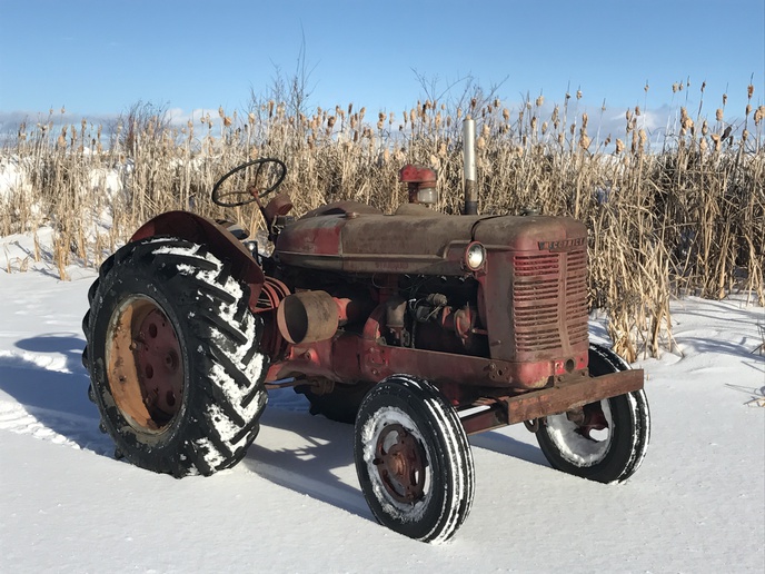 1953 W4 Mccormick  -  this w4 is serial # 34113 which is the 64th tractor from the end of production before the supers came out. it has the super upgrades.