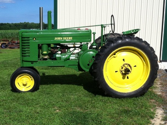 1944 John Deere A - This was my first tractor and had a lot of fun with  it so far. Nothing like a hand crank!