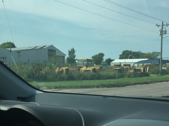 Minneapolis Moline - Passed by this old Minneapolis Moline dealership  in Fairmont MN. Looks like the tractors haven't  moved since they were new on the lot, stuck in  time.