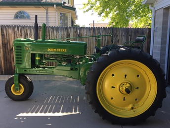 1947-1952 - I am selling my John Deere BN Tractor.  I'm not sure  what year it is.  It has new paint, new battery, new  seat, new front tire, an electric starter, and  rebuilt engine.  It runs great, just drove it in a  local parade.  I keep it stored in a garage.  Please  call 801-703-5459.  Asking 8,000 OBO.