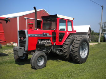 Massey Ferguson 1155 - Came across this pic of an 1155 I painted a few years back. This one even had an added turbo (notice the bubble in the hood). The Massey's sure are pretty when they are all painted up.