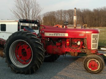 Farmall 450  - just got her out of winter storage!  Im the 3rd owner  of this original paint 1600 hour beauty.  It was  Robert Diener's before.  Anyone that reads red power  may know of him.  His wife still makes the serial  number tags.  I just maintain Clara (named after  first owners wife) in this condition so it will be  here for the next generation in this condition.