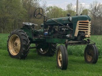 1960 Oliver 440 - 1960 Oliver 440 tractor. Have complete set of rear and front cultivators  along with Woods 60 mower. Front wheel weights ,top link, drawbar also. Complete unit.  Mechanical, paint restoration to start in fall.