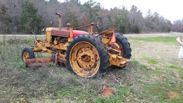 Farmall Grader Tractor - Would anyone know what a Farmall Motor grader tractor  be worth.