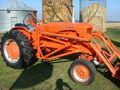 1954 Allis Chalmers WD45 - Great tractor with trip snow bucket. Moves lots of snow with added  chains + fluid in rears. Was converted to 12 volts before I bought it.