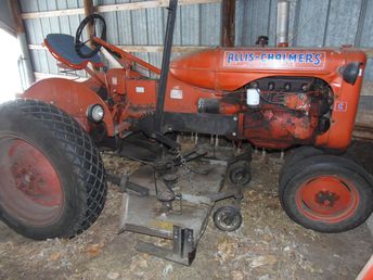 1941 Allis Chalmers C - This is an incredibly nice tractor for it's age. I truly enjoy mowing the  lawn, here on the farm, with this tractor.