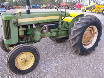 1955 John Deere 40U  - Starts and runs absolutely great! Very good sheet  metal. Lots of new parts such as new seat, steering  wheel, choke cable, shifter boot, comprehensive  carburetor rebuild. Back tires match and are 90% not  dry rotted. Has complete 3pt but it is NOT working  and the lower left hand pivit pin is missing. Just a  little more tlc and this would be a great tractor to  use or collect. Trades accepted and we can assist  with shipping anywhere in the world. Feel free to  call or email with any questions. Thanks for looking.