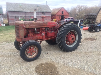 Mccormick Super W6 - Not sure what year this is? Dad bought it at an  auction in the '80's and engine was stuck. Had to re-  ring her and replace one sleeve but she runs great!