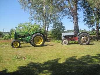 1947,1948 - My 1947 John Deere BR and 1948 Ford 8NAN. Have had them nearly 20 years now.