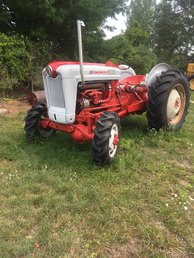 1959 Ford 851 4WD - I've been restoring this tractor for about 5 years  now, but I've kinda lost interest. It's about 85%  done. Looking at maybe selling it if there are any  serious offers out there. It runs and drives good.