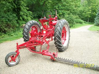 1945 Farmal H - Farmall H with a 1947 internationaql sickle mower both work very well I rebuile the H and fixed up the mower