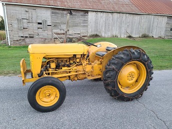 1962 MF35 Utility (Turf Special) - UGM656000011 It has a 4-cylinder Contential Gas  engine, 3x2 transmission, 2 stage  clutch, standard (no ground speed)  PTO, power steering, accelerator  pedal, split brakes, basic tachometer  (not a Tractormeter, speed ranges are  listed on the right fender), quadrant  throttle plate (the thing with the  notches to prevent the throttle lever  from creeping), standard tractor  wheels and tires (not the small rims  and wide tires seen elsewhere on the  Turf Specials), and of course is  yellow.
