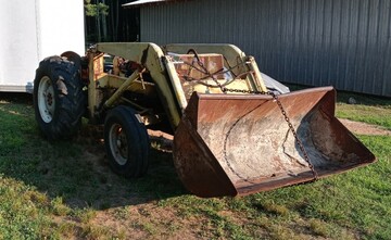 Massey Ferguson - I rescued this tractor from it's 15 year parking spot  and attempting to identify the model. I was able to  locate the engine plate, which was a Perkins diesel  AD3 152 but can not locate any other numbers.