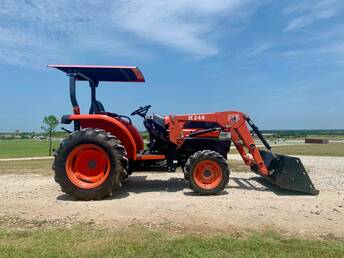 2003 Kubota L3130D 4X4 Tractor - 2003 Kubota L3130D 31HP Tractor with only  375 hrs. This tractor has the 8x8 shuttle  shift transmission making it very easy to  operate and also has selectable four  wheel drive. The loader is a Bush Hog  M246 and has a pin on bucket.