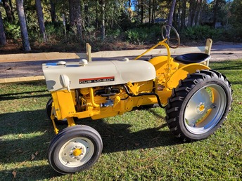 1965 International Cub Lo Boy - This is a tractor that my Dad bought when  I was about 10 years old (about 1972). We  cut the grass and managed our garden with  it. He passed away in 1993 and I ended up  with it at my house in 2016 when we had to  move my mom out. I started the restoration  in late 2020 and finished it in November  of 2021. The engine was locked up so I  rebuilt it completely, sand blasted it  down to the bare metal and painted it back  to its original colors. Dad would be  proud. Thanks to Yesterdays Tractor for  all of the parts I needed.