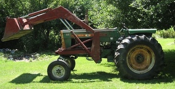 1964 Oliver 1650 - Right now I'm using it for a bulldozer and after  brush hog usage. Runs great.