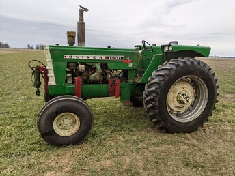 Oliver 1950 GM Diesel - Very good condition, wheatland front end, hydra power  12 forward and 4 reverse, 2062 hours, new front  tires, complete sheet metal, optional front blade.