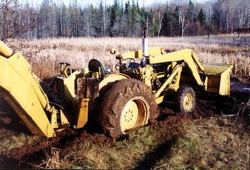Ford 4500 (Stuck) - Great running tractor, it just keeps getting stuck. One of the downfalls of beaver dam flooding.
