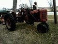 Hillbilly Farmall C at Auction - Heres a farmall C at a local auction, gas tank is a 5 gal plastic gas can.