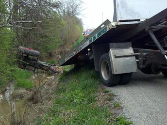Oliver In The News - from wlwt.com<P>Authorities said a Blanchester man was injured when his tractor rolled over in Brown County on Sunday.  <P><P><P><P><P><P> Perry Township police said Jeffrey Metzger, 44, was driving his tractor on Garner Road when he thought he heard a car approaching. After looking back, officers said Metzger lost control of the vehicle and went off the road into a ditch.  Police said the tractor ended on its side, trapping Metzger.  Metzger was able to free himself, and then climbed out of the ditch and flagged down a neighbor who called 911, police said.  Metzger was taken to University Hospital, where he is being treated for injuries that are not life-threatening, officers said.  The investigation is ongoing, police said. <P>Read more; http;//www.wlwt.com/news/30757675/detail.html#ixzz1qG5hGeQE