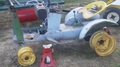 John Deere 110 - A guys son took this tractor apart and  lost many of the parts, this is what is  left to restore.