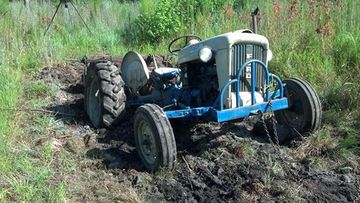 1964 Ford 4000 - discing food plot, ground give way to a old stump hole