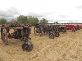 Tractor Row At Huge Auction - roughly 7 acres of tractors, implements and stationary engines up for auction on Oct. 16-17 Lotsa choice machinery!