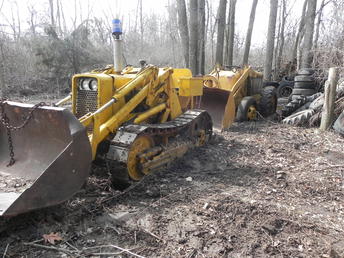 Mucked-Up Hough Ha Loader #1 - I backed my 1952 Hough 'HF' Payloader into a deep hole in the tire swamp out back, then I tried to pull it out with my 1962 Oliver OC46, but it couldn't pull a dead weight like this on soft ground. Hmmm, maybe if I had a helper to pull me whilst I drove the 'HF'? Unfortunately, since my wife lost a foot the last time she helped me and my kids are all moved away, I got nobody. So....