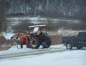 1972 Allis Chalmers 185 # 2 - Getting her out. Glad no cars were coming;)