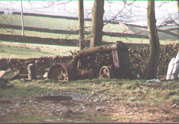 Fordson - As Found - It was quite rusted and the steering wheel had rusted completely off.  Had been sitting in the same spot for many years and was saved at the last minute from being cremated by a bulldozer.  Found in the UK.