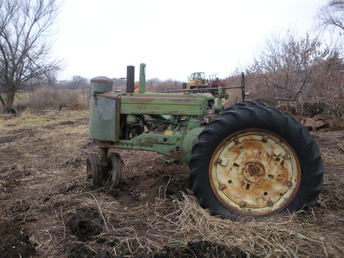 1951 John Deere A - Just got the corn picker off. Needs a carb as the old one is missing. Motor was rebuilt once and a power block was put in so now it has the power of a G. Purchased new by my grandfather who traded in a 1936 A for this one.