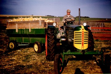 1951 Oliver 77 Row Crop - Been in the family since new.  That's my  great grandpa Nels Norlin pulling in a  load of corn.