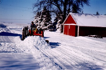 1951 Oliver 77 Row Crop - My dad on the 77 pushing some snow with  the New Idea loader. Photo taken Mar.  1963.